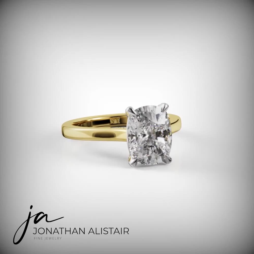 The Tulbagh — an elongated cushion diamond solitaire in yellow gold with platinum prongs, custom commission by Jonathan Alistair